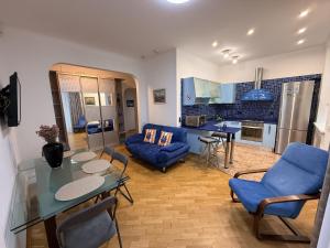 Μια τηλεόραση ή/και κέντρο ψυχαγωγίας στο Kyiv 3D Kruglik Apartment