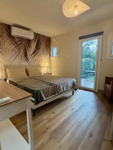 Postel nebo postele na pokoji v ubytování Le Ruisseau