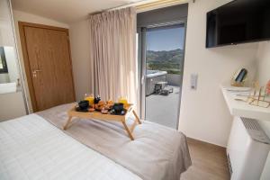 Postel nebo postele na pokoji v ubytování Casa Teo, By Hellocrete