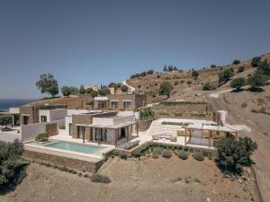 an aerial view of a home in the desert at ArtOikia Luxury Villas, By Hellocrete in Saktoúria