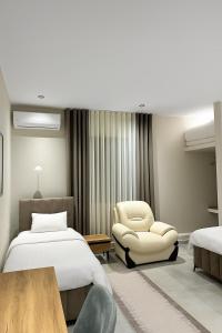 Ένα ή περισσότερα κρεβάτια σε δωμάτιο στο Vila Erti Berat