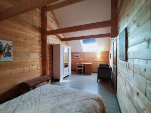 Postel nebo postele na pokoji v ubytování Aux Gîtes d'Orient