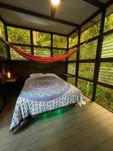Postel nebo postele na pokoji v ubytování Jungle Loft