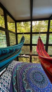 Postel nebo postele na pokoji v ubytování Jungle Loft