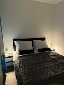 Postel nebo postele na pokoji v ubytování Apartament Zefir + 3 fotografie