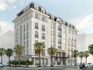 eine Darstellung eines weißen Gebäudes mit Palmen in der Unterkunft PureJoy Hotel City Center Phu Quoc in Phu Quoc