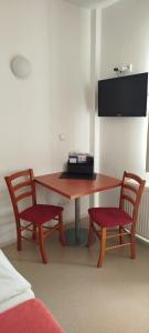 TV a/nebo společenská místnost v ubytování Sport Hotel České Budějovice