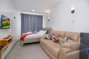 Ένα ή περισσότερα κρεβάτια σε δωμάτιο στο Royal suburbs by Tsavo