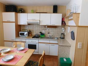 Kuchyň nebo kuchyňský kout v ubytování Holmbauer Ferienwohnung Panoramablick