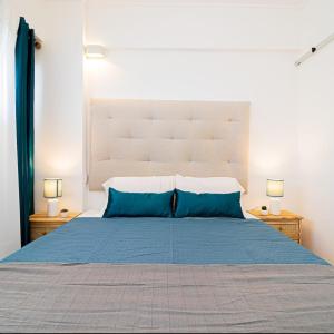 Postel nebo postele na pokoji v ubytování Costa Terrace