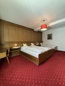 Postel nebo postele na pokoji v ubytování Ciasa Nives + 29 fotografií