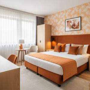 a hotel room with a large bed and a table at Boulevard Side Hotel in Baku +132 photos