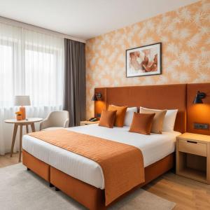 Ένα ή περισσότερα κρεβάτια σε δωμάτιο στο Boulevard Side Hotel