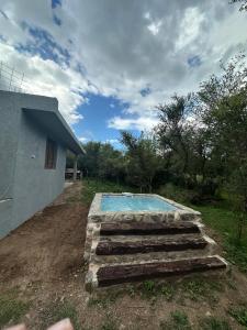 Bazén v ubytování Cabaña El Quebrachal nebo v jeho okolí