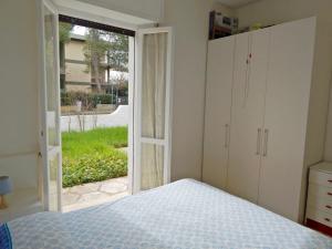 Ένα ή περισσότερα κρεβάτια σε δωμάτιο στο Marcelli, trilocale con giardino a 200mt dal mare