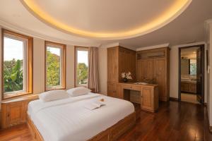 Voodi või voodid majutusasutuse River Garden Villa 7BR 7WC Pool&Garden toas +84 fotot