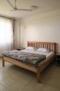 Ένα ή περισσότερα κρεβάτια σε δωμάτιο στο Tsavo Zurani