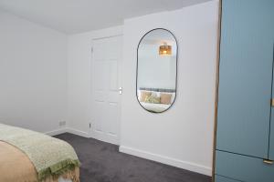 Ένα ή περισσότερα κρεβάτια σε δωμάτιο στο 1A Lime Street