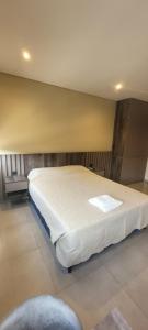 Ένα ή περισσότερα κρεβάτια σε δωμάτιο στο Departamentos Premium