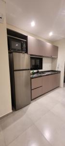 Η κουζίνα ή μικρή κουζίνα στο Departamentos Premium