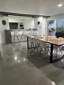 Kuchyň nebo kuchyňský kout v ubytování Loft con pileta compartida + 5 fotografií