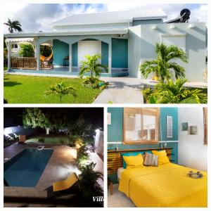 een huis met een geel bed en een zwembad bij Villa L'Artist en bord de mer avec piscine privée in Sainte-Rose