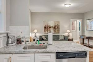 a kitchen with a sink and a counter top at Beautiful Brand New Tower Grove Unit 1s in Clifton Heights
