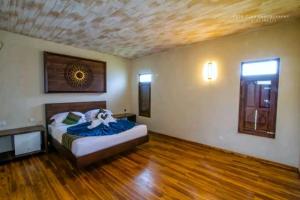 Postel nebo postele na pokoji v ubytování BB villa - Rekawa