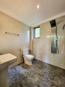 Koupelna v ubytování Shenu Villa