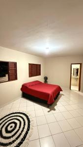 Giường trong phòng chung tại Pousada cosmo