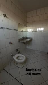 Phòng tắm tại Pousada cosmo +12 ảnh