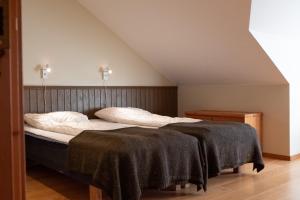 Postel nebo postele na pokoji v ubytování Åreguiderna - Bubblans lägenheter Åre Torg