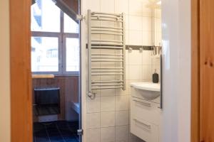 Koupelna v ubytování Åreguiderna - Bubblans lägenheter Åre Torg + 55 fotografií