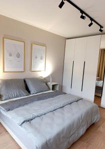 Postel nebo postele na pokoji v ubytování Apartament kaszmir 1