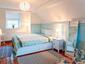 Postel nebo postele na pokoji v ubytování Ferienhaus Prütz + 22 fotografií