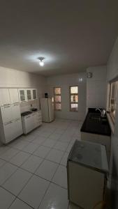 Nhà bếp/bếp nhỏ tại Pousada cosmo