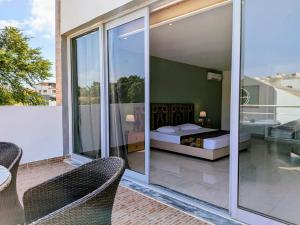 Postel nebo postele na pokoji v ubytování Strela Hotel Cachoeira