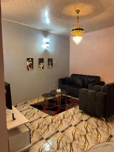 Posezení v ubytování Aristo Immobilier + 12 fotografií