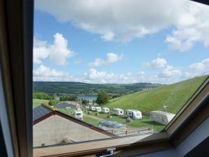 a view from a window of a campground at The Cob Barn - Ukc1852 in Shaldon