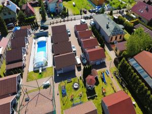 Πισίνα στο ή κοντά στο Holiday homes with swimming pool, Miedzyzdroje