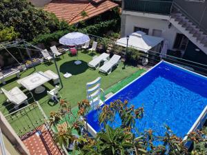 an overhead view of a backyard with a swimming pool at Althea Etna Garden in Nicolosi