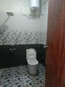 Ένα μπάνιο στο Lekwar Home stay & Restaurant