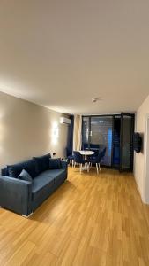 Χώρος καθιστικού στο Orbi City Hotel