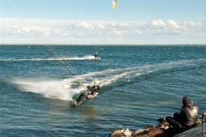 a man kite surfing in the ocean on the water at Surf and Chill in Orth
