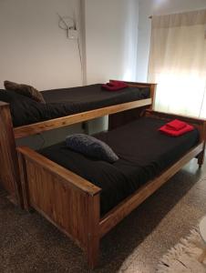 Ένα ή περισσότερα κρεβάτια σε δωμάτιο στο PABLO`S departamento