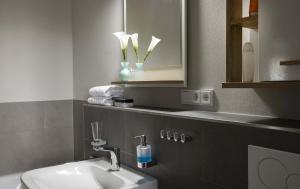 Koupelna v ubytování Marco Polo + 9 fotografií