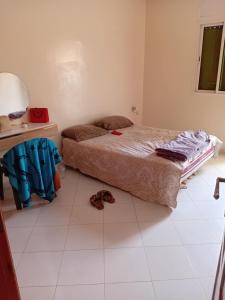 Postel nebo postele na pokoji v ubytování Kamar stay + 1 fotografie