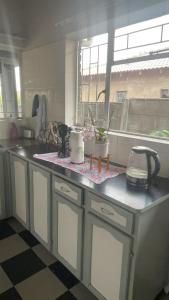 a kitchen with a counter top with appliances on it at 33 Boeren in Vryheid