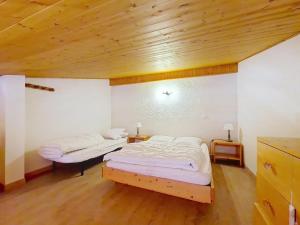 Ένα ή περισσότερα κρεβάτια σε δωμάτιο στο Alpenlake AP120 VIEW & NATURE 5 pers