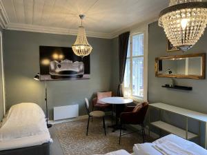 Postel nebo postele na pokoji v ubytování Lærdalsøren Motor Guesthouse